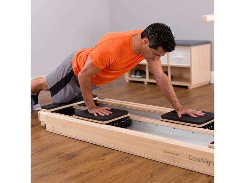 Balanced Body , a sliding carriage for intense core training and Pilates workouts